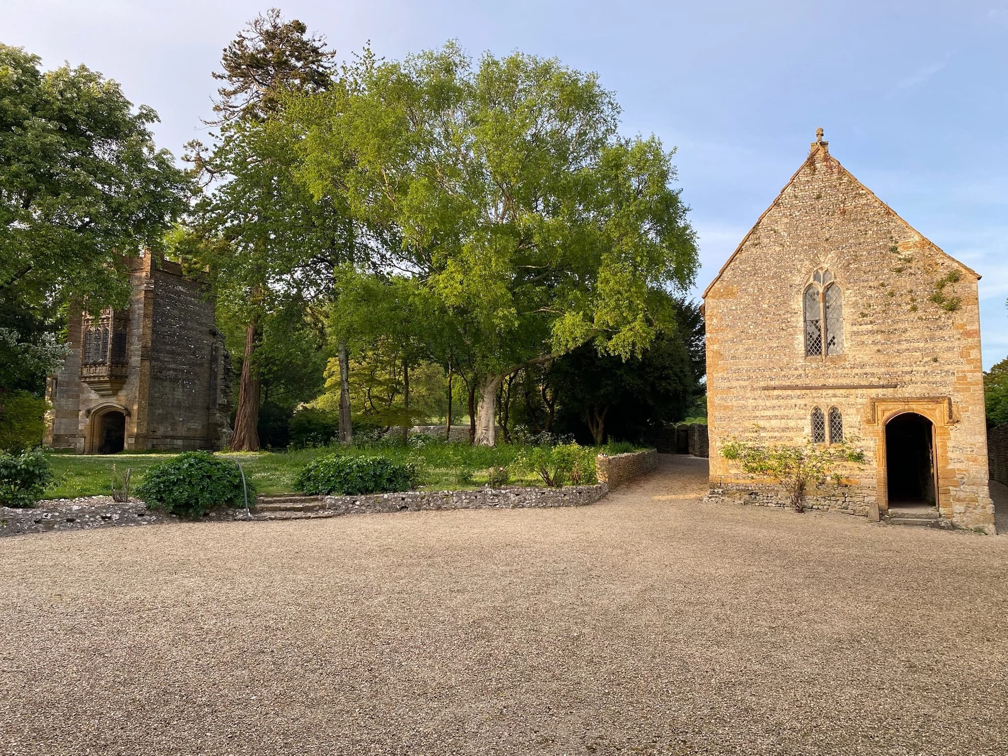 The Monument courtyard at the heart of Cerne Abbey